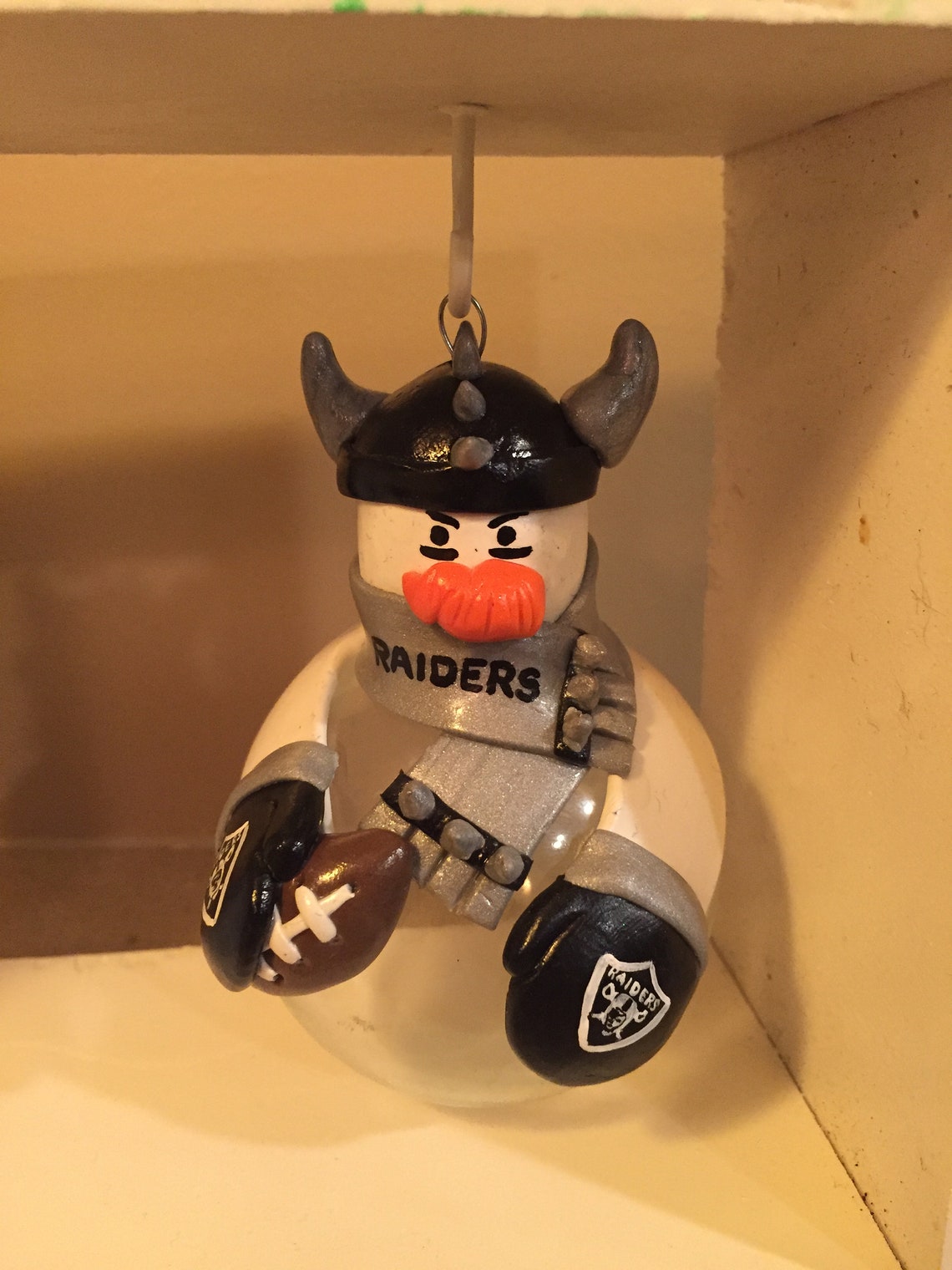 Oakland Raiders football ornaments