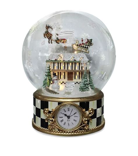 Glass clock snow globe